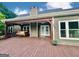 Spacious deck with covered seating offering an outdoor living space perfect for relaxation and enjoyment at 1040 Rock Creek Rd, Social Circle, GA 30025