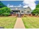 Charming home with a spacious backyard and an inviting deck, perfect for outdoor entertaining and relaxation at 1040 Rock Creek Rd, Social Circle, GA 30025
