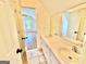 Bathroom featuring a dual vanity providing lots of space for grooming and storage at 1040 Rock Creek Rd, Social Circle, GA 30025