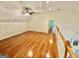 Bonus room with hardwood floors and an overhead fan at 1040 Rock Creek Rd, Social Circle, GA 30025