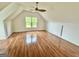 Bonus room with hardwood floors and gabled roof at 1040 Rock Creek Rd, Social Circle, GA 30025