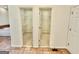 Spacious walk-in closets with shelving, adjacent to a soaking tub at 1040 Rock Creek Rd, Social Circle, GA 30025