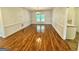 Dining room with hardwood floors, wainscoting and elegant chandelier lighting at 1040 Rock Creek Rd, Social Circle, GA 30025