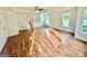 Spacious main bedroom features hardwood floors, tray ceiling, and lots of natural light at 1040 Rock Creek Rd, Social Circle, GA 30025
