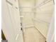Walk-in closet offers carpet floor and white wire shelving for optimal storage at 1040 Rock Creek Rd, Social Circle, GA 30025
