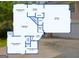 Detailed floor plan showcasing the layout of the living room, kitchen, primary bedroom, and garage at 402 Sherrels Frd, Peachtree City, GA 30269