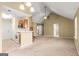 Open concept kitchen and living area with vaulted ceiling and lots of natural light at 402 Sherrels Frd, Peachtree City, GA 30269
