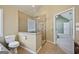 An elegant bathroom showcases a glass enclosed shower with dual shower heads and tiled flooring at 612 Longer Dr, Peachtree City, GA 30269