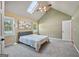 Comfortable bedroom with skylight, vaulted ceiling, natural light and neutral tones for a relaxing ambiance at 612 Longer Dr, Peachtree City, GA 30269