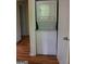 Convenient laundry area equipped with a stacked washer and dryer unit, optimizing space at 695 Frog Rd, Locust Grove, GA 30248