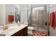 Bathroom featuring a glass-enclosed shower, tiled walls, and a modern vanity at 120 Westover Commons, Fayetteville, GA 30214
