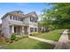 Beautiful home with a well-maintained lawn and charming facade, showcasing its curb appeal in a serene setting at 120 Westover Commons, Fayetteville, GA 30214