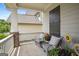 Cozy front porch features comfortable seating, decorative plants, and a welcoming ambiance at 120 Westover Commons, Fayetteville, GA 30214