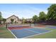 Community tennis courts offering residents opportunities for recreation and friendly competition at 120 Westover Commons, Fayetteville, GA 30214