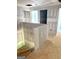 Unfinished staircase featuring a newly constructed railing, providing a blank canvas to personalize the space at 107 Oak Rd, Locust Grove, GA 30248
