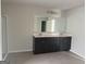 A spacious Primary bathroom features a dual vanity at 1124 Pebble Creek Ln, Locust Grove, GA 30248