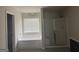 This bathroom features a bathtub, shower, and 'Relax, Renew, Refresh' wall art at 1124 Pebble Creek Ln, Locust Grove, GA 30248