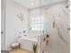Elegant bathroom with a soaking tub, glass-enclosed shower, and modern fixtures at 19 Mediterranean Ave # 506, Sharpsburg, GA 30277