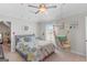 Bedroom includes ceiling fan, large window with natural light, and a hanging hammock chair at 19 Mediterranean Ave # 506, Sharpsburg, GA 30277