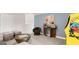 Relaxing basement showcasing a custom wet bar and a cozy seating area with arcade games at 604 Parnassus Rd # 05, Locust Grove, GA 30248