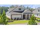 Beautiful single-Gathering home with brick, manicured lawn, and 2-car garage at 604 Parnassus Rd # 05, Locust Grove, GA 30248