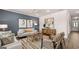 Modern living room with stylish furniture, decorative accents, and a warm, inviting atmosphere for relaxing and entertaining at 604 Parnassus Rd # 05, Locust Grove, GA 30248