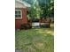 Beautiful wooden back deck outside of a red brick home at 309 Cornish Mountain Rd, Covington, GA 30014