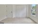 Bedroom with neutral carpet, large closet, and window views that bring in natural light at 400 Walnut Grove Rd, Peachtree City, GA 30269
