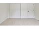 This carpeted bedroom features a double-door closet and base trim at 400 Walnut Grove Rd, Peachtree City, GA 30269