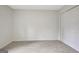 This bedroom features neutral carpeting and a double-door closet at 400 Walnut Grove Rd, Peachtree City, GA 30269