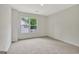 This bedroom offers neutral carpeting, a window, and great natural light at 400 Walnut Grove Rd, Peachtree City, GA 30269