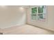Bright bedroom features a large window and natural light at 400 Walnut Grove Rd, Peachtree City, GA 30269
