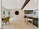 Open concept dining room with view of kitchen island and view of custom built-in cabinetry at 400 Walnut Grove Rd, Peachtree City, GA 30269