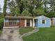 Charming single-story home with a partially brick exterior and a cozy, inviting walkway at 4298 Brookside Dr, Forest Park, GA 30297