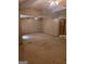 Spacious living room featuring neutral walls, ceiling fan, and lots of potential at 4298 Brookside Dr, Forest Park, GA 30297