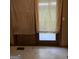 Room featuring sliding glass door covered by curtains at 4298 Brookside Dr, Forest Park, GA 30297