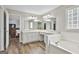 Bright bathroom with a double sink vanity and large tub at 215 Murphy Creek Ln, Fayetteville, GA 30215