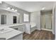 Large bathroom with a corner tub and a separate shower stall at 215 Murphy Creek Ln, Fayetteville, GA 30215