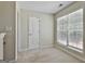 Cozy bedroom with carpet, window, closet, and neutral color scheme at 215 Murphy Creek Ln, Fayetteville, GA 30215