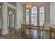 Bright dining area with wood floors, trim and windows, perfect for Gathering gatherings at 215 Murphy Creek Ln, Fayetteville, GA 30215