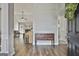 Open foyer showing seamless flow into living area with natural light and wood floors at 215 Murphy Creek Ln, Fayetteville, GA 30215