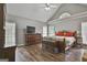 Vaulted ceilings and plenty of natural light make this main bedroom a relaxing retreat at 215 Murphy Creek Ln, Fayetteville, GA 30215