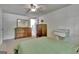Bedroom with wooden furniture and a view into the en suite bathroom at 131 Sweetgum Rd, Peachtree City, GA 30269
