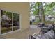 Wooden deck with outdoor seating and sliding door access at 131 Sweetgum Rd, Peachtree City, GA 30269
