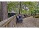 Wooden deck with outdoor seating at 131 Sweetgum Rd, Peachtree City, GA 30269
