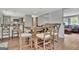 Dining area with open layout to kitchen and living area featuring seating for six and natural light at 131 Sweetgum Rd, Peachtree City, GA 30269