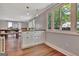 Kitchen eat-in area has a view of the large, landscaped backyard at 131 Sweetgum Rd, Peachtree City, GA 30269