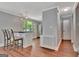 Bright eat-in kitchen features stainless steel appliances and hardwood floors at 131 Sweetgum Rd, Peachtree City, GA 30269
