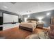 The cozy bedroom area includes a projector screen, large bed, and comfortable seating arrangements at 70 Lake Charles Xing, Covington, GA 30016
