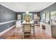 Dining room with hardwood floors, table, chairs, bench and decorative vases at 70 Lake Charles Xing, Covington, GA 30016
